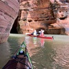 Guide demonstrating kayaking techniques