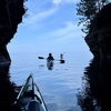 Kayakers viewing rock formations