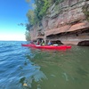 Kayakers exploring Lake Superior coastline