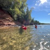 Group of kayakers near the shore
