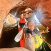 Kayakers exploring sea caves